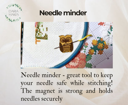 Needle minder with owl design on embroidery hoop and cross-stitched owl.