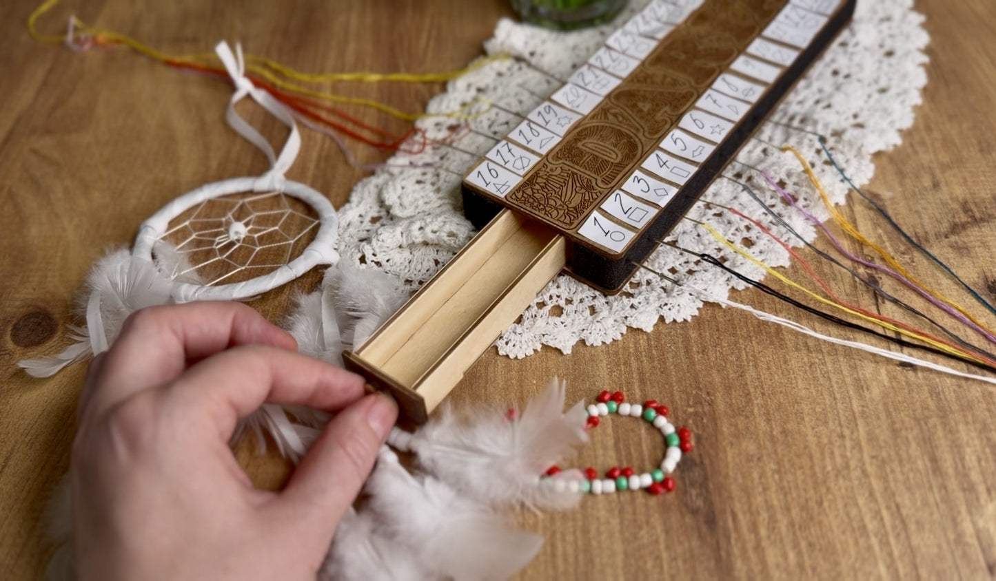 Wooden floss organizer for cross stitch with multiple holes for embroidery threads. This cross stitch floss organizer helps keep embroidery floss neatly separated and easy to access while stitching. A practical embroidery tool for cross stitch projects, needlework, and DIY embroidery kits.

Cross stitch thread organizer made of wood designed to sort embroidery floss by color. Perfect embroidery accessory for cross stitch lovers, helping keep threads tidy during stitching. Ideal for needlework storage, embro