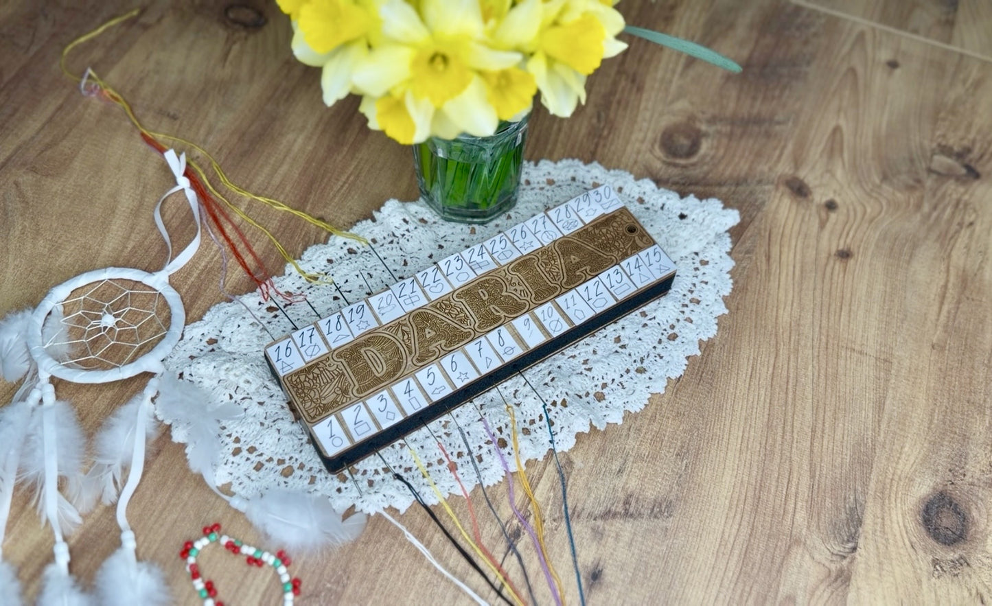 Wooden floss organizer for cross stitch with multiple holes for embroidery threads. This cross stitch floss organizer helps keep embroidery floss neatly separated and easy to access while stitching. A practical embroidery tool for cross stitch projects, needlework, and DIY embroidery kits.

Cross stitch thread organizer made of wood designed to sort embroidery floss by color. Perfect embroidery accessory for cross stitch lovers, helping keep threads tidy during stitching. Ideal for needlework storage, embro